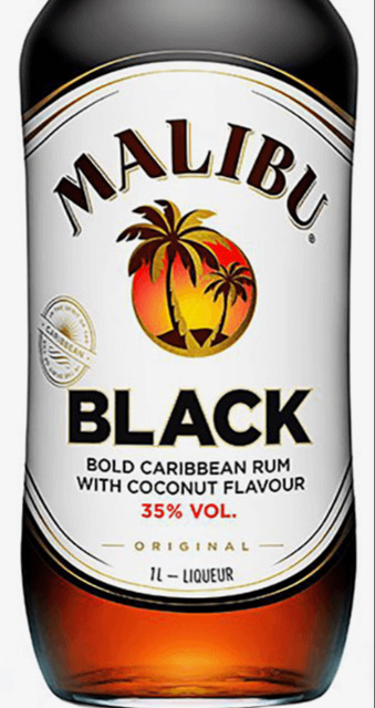 A bottle of malibu black bold caribbean rum with coconut flavour