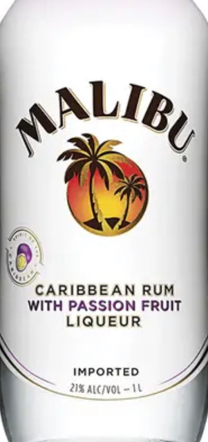 A bottle of malibu caribbean rum with passion fruit liqueur