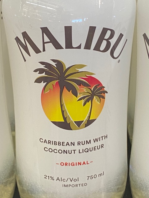 A bottle of malibu caribbean rum with coconut liqueur