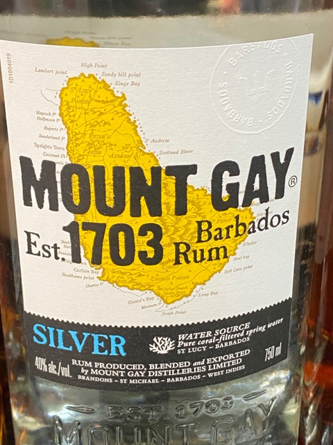 A bottle of mount gay est 1703 barbados silver rum