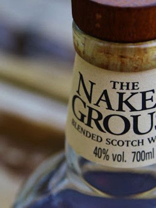 A bottle of the nake grouse blended scotch whiskey