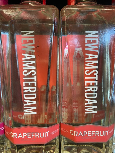 Two bottles of new amsterdam grapefruit vodka