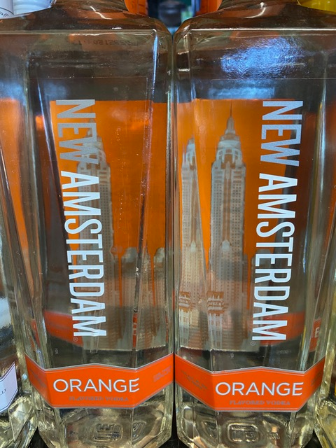 Two bottles of new amsterdam orange are sitting next to each other