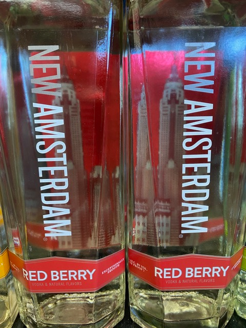 Two bottles of new amsterdam red berry vodka