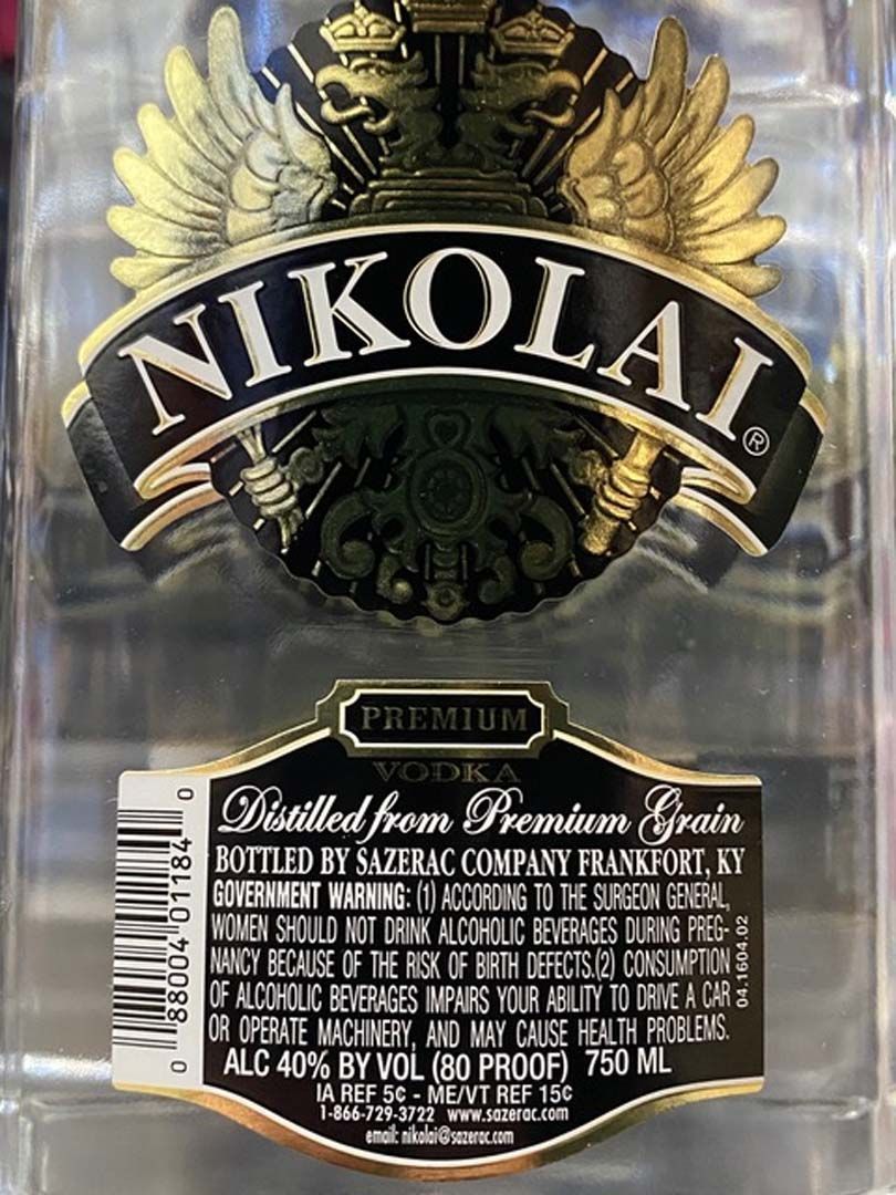 A close up of the label of a bottle of nikolai vodka.