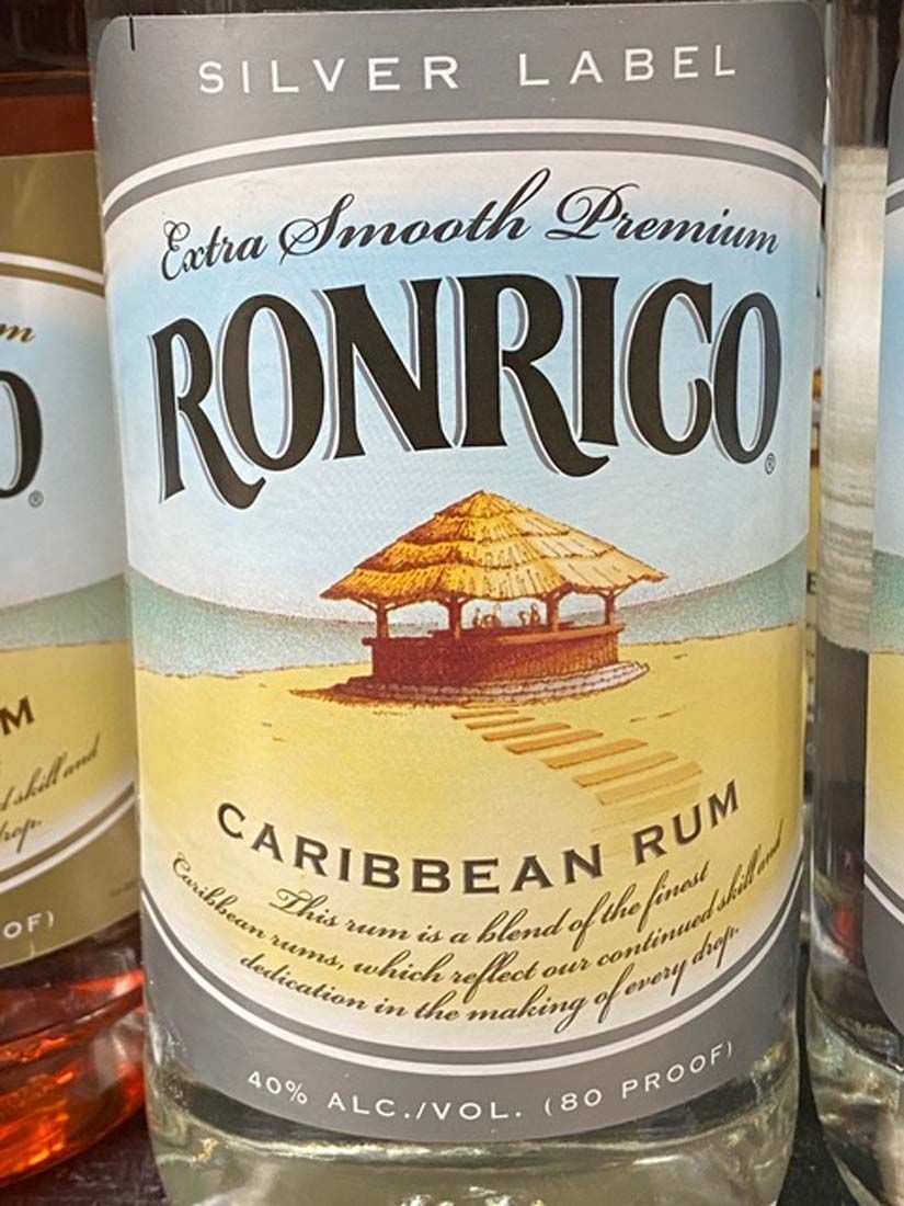 A close up of a bottle of ronrico caribbean rum
