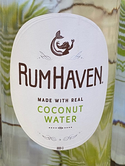 A bottle of rumhaven made with real coconut water