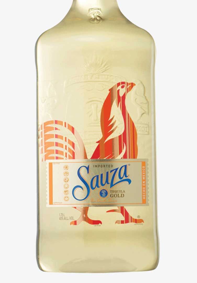 A bottle of sauza tequila with a rooster on the label