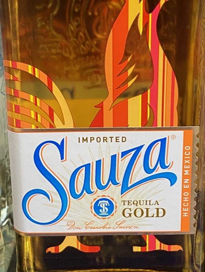 A bottle of sauza tequila gold imported from mexico