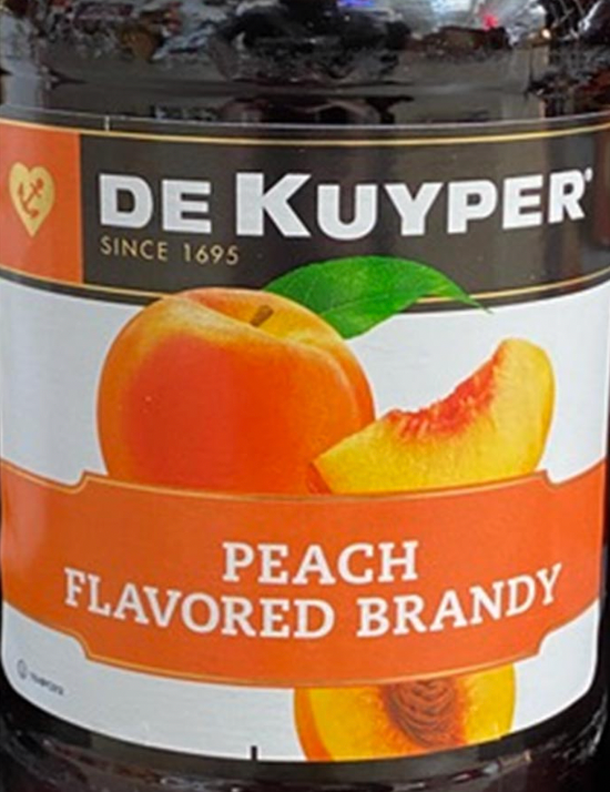 A jar of de kuyper peach flavored brandy