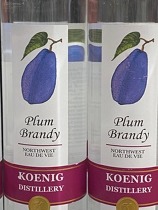 Two bottles of plum brandy from koenig distillery