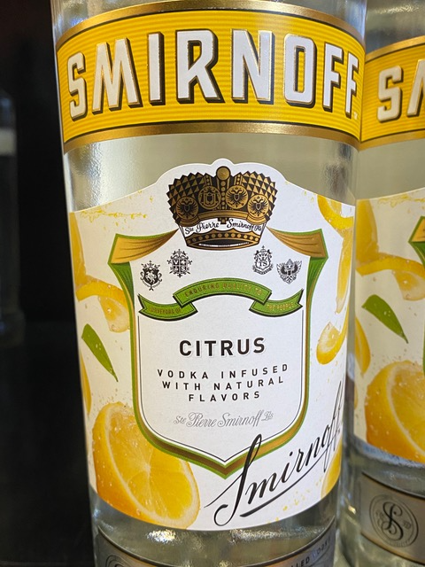 A bottle of smirnoff citrus vodka infused with natural flavors