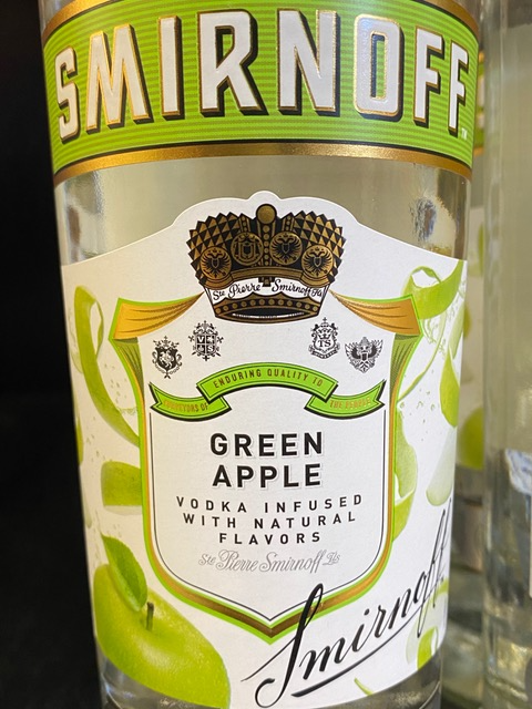 A bottle of smirnoff green apple vodka