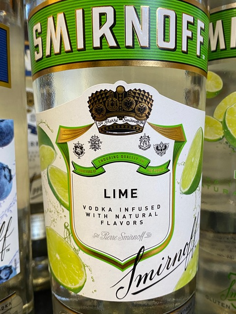 A bottle of smirnoff lime vodka infused with natural flavors
