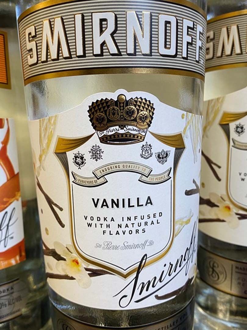 A close up of a bottle of smirnoff vanilla vodka