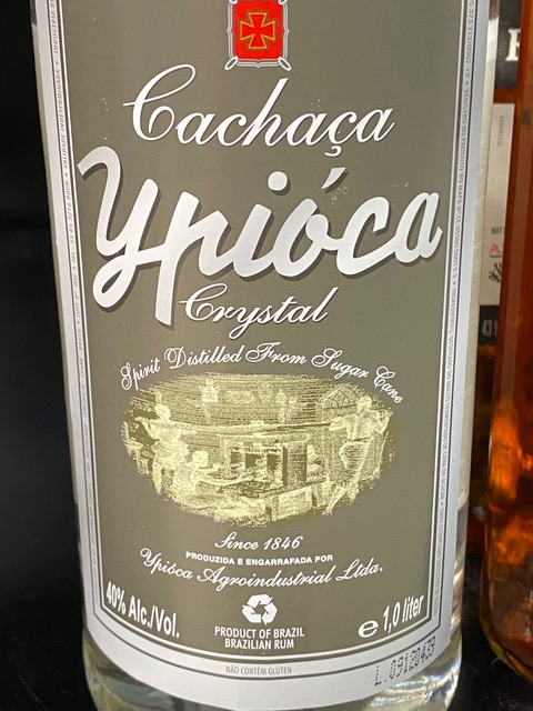A close up of a bottle of cachaca ypioca crystal