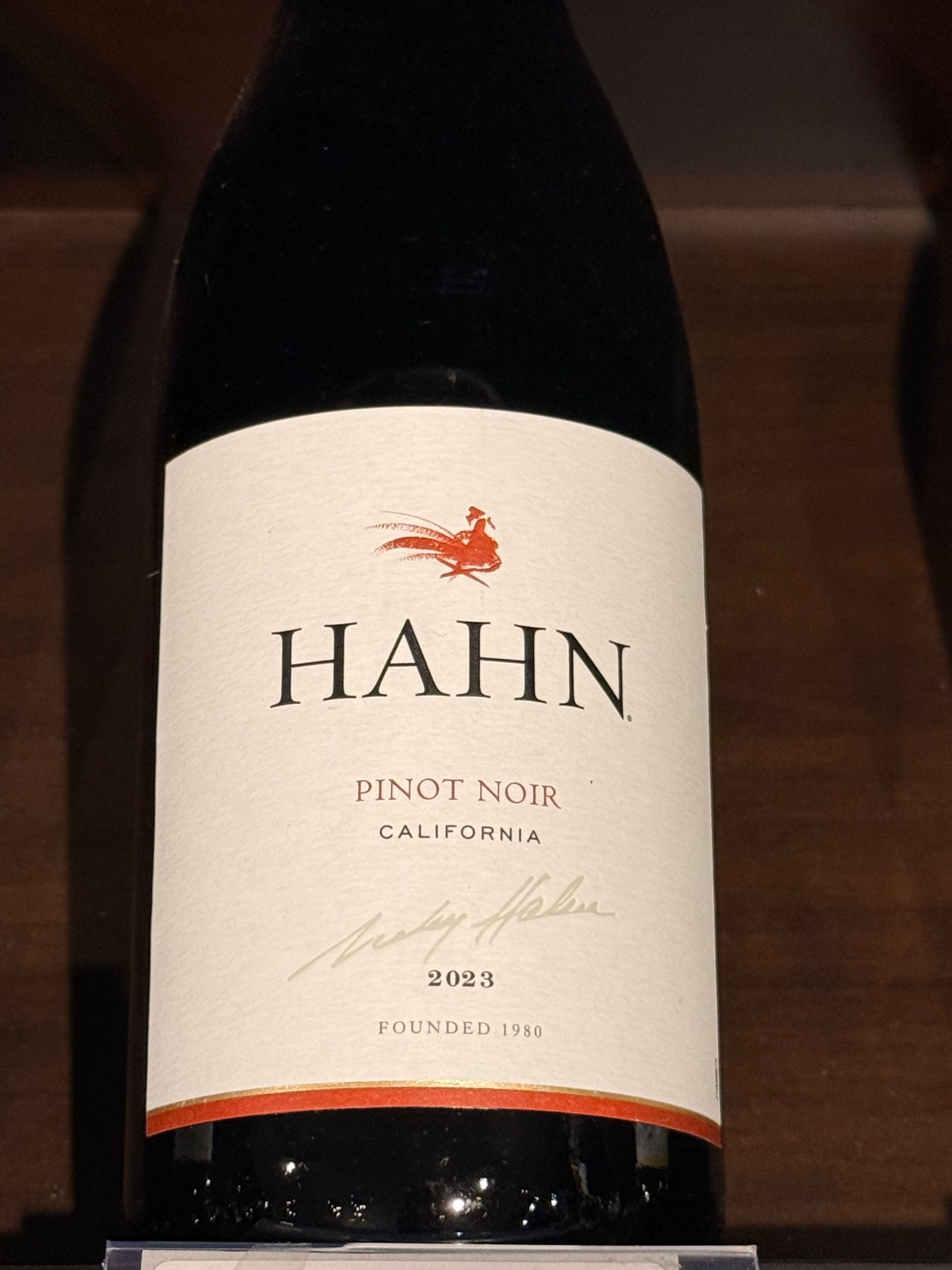 Bottle of Rutherford Ranch 2013 Chardonnay, Napa Valley. Beige label with red logo and text on a dark brown bottle.