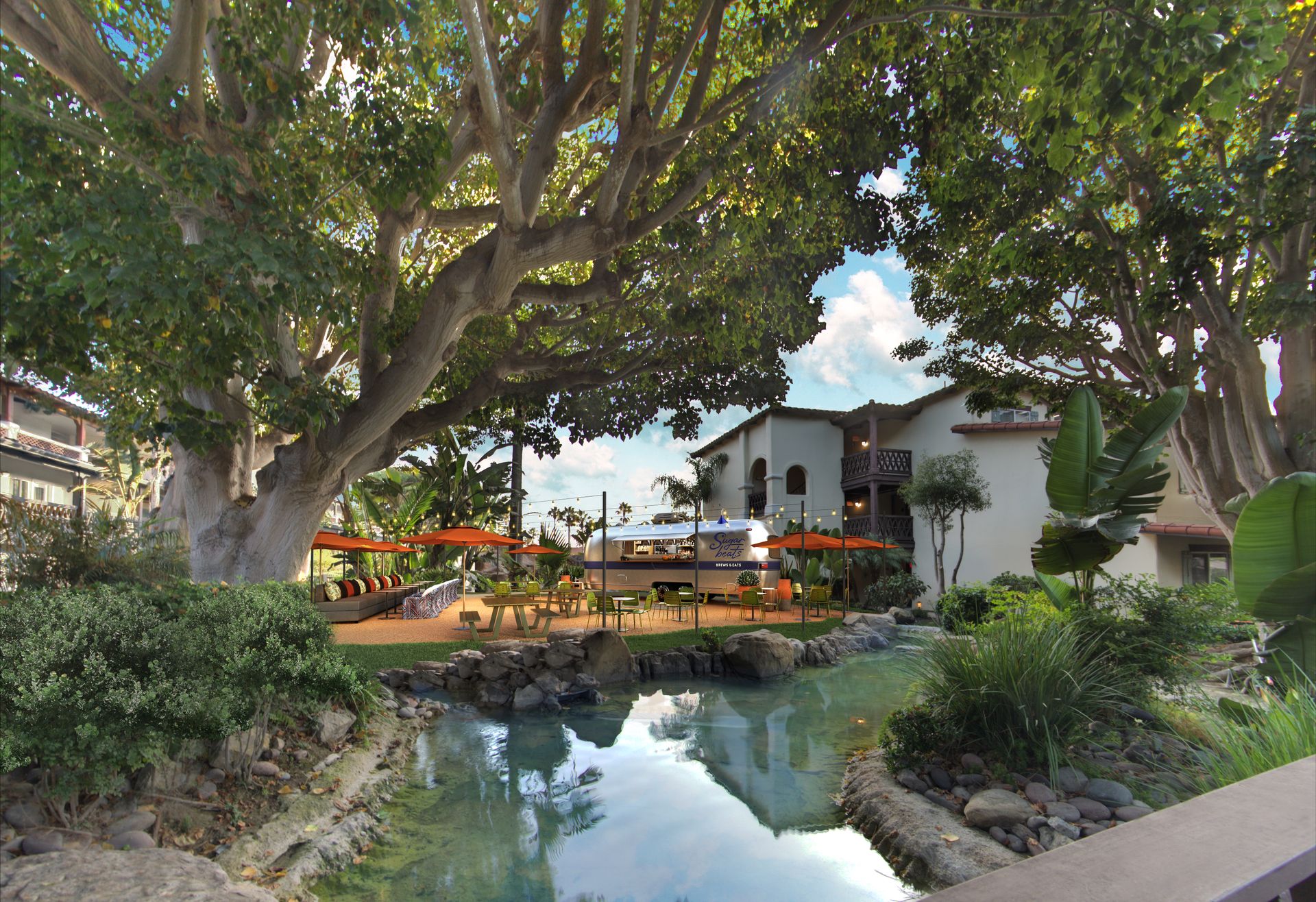 A bridge over a river with a building in the background