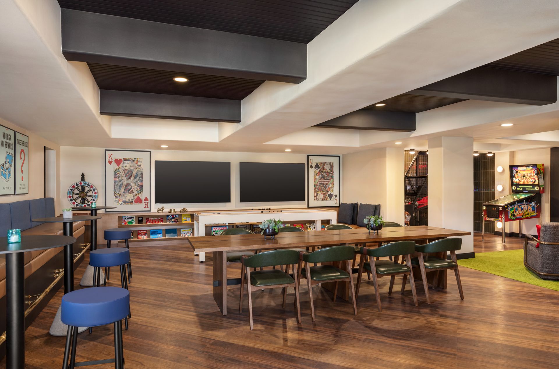 A large room with a table and chairs in it