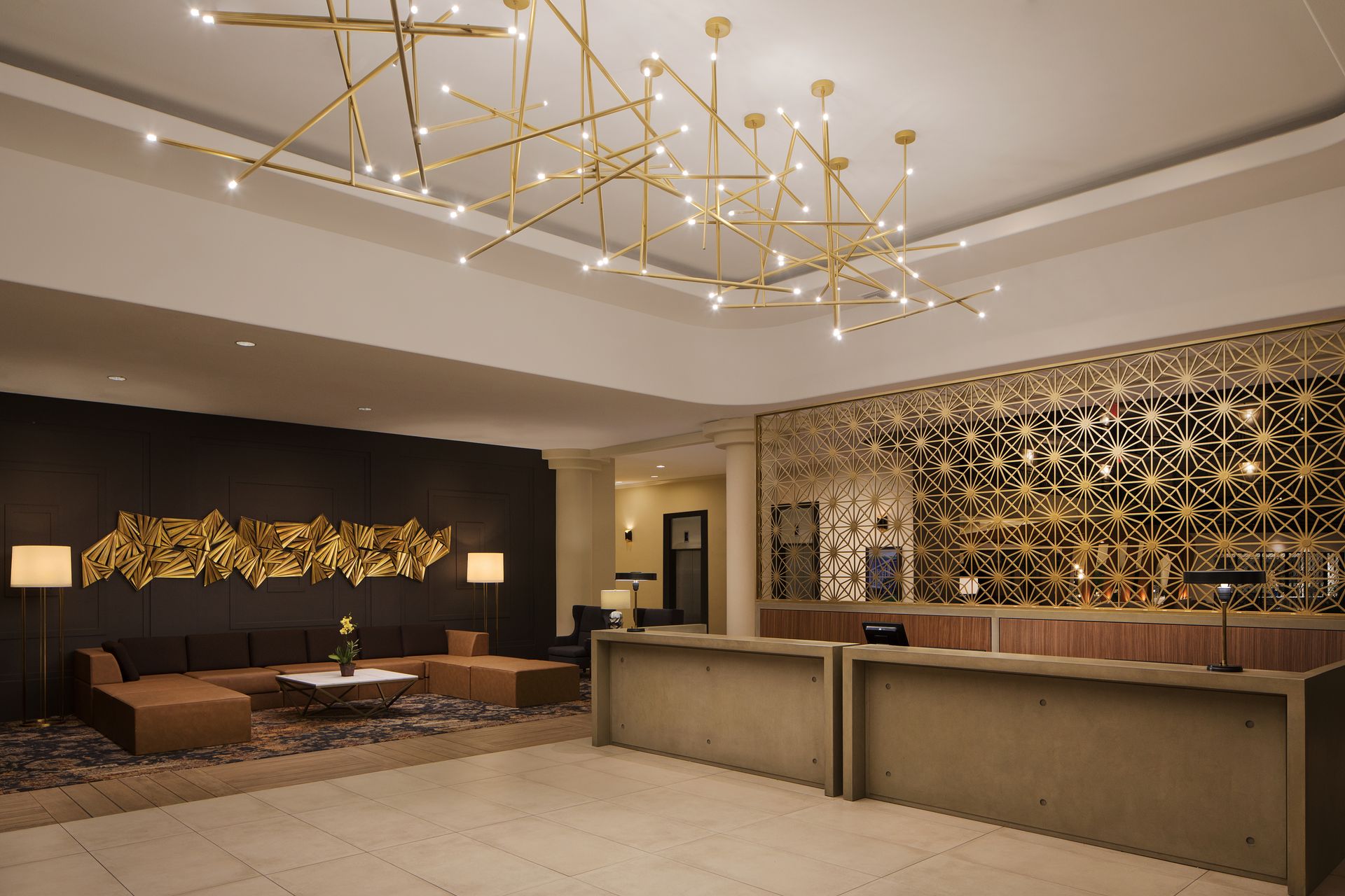 An artist 's impression of a hotel lobby with a large chandelier hanging from the ceiling.