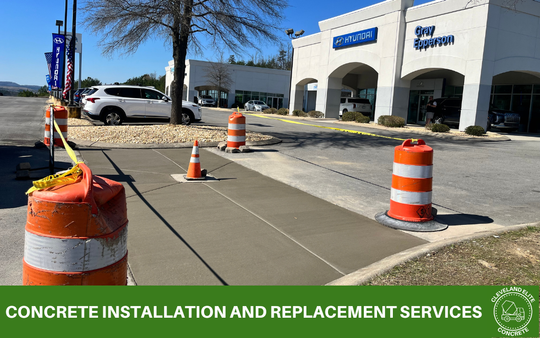 picture of a concrete contractor working with text underneath that says concrete installation and replacement services and the cleveland concrete logo
