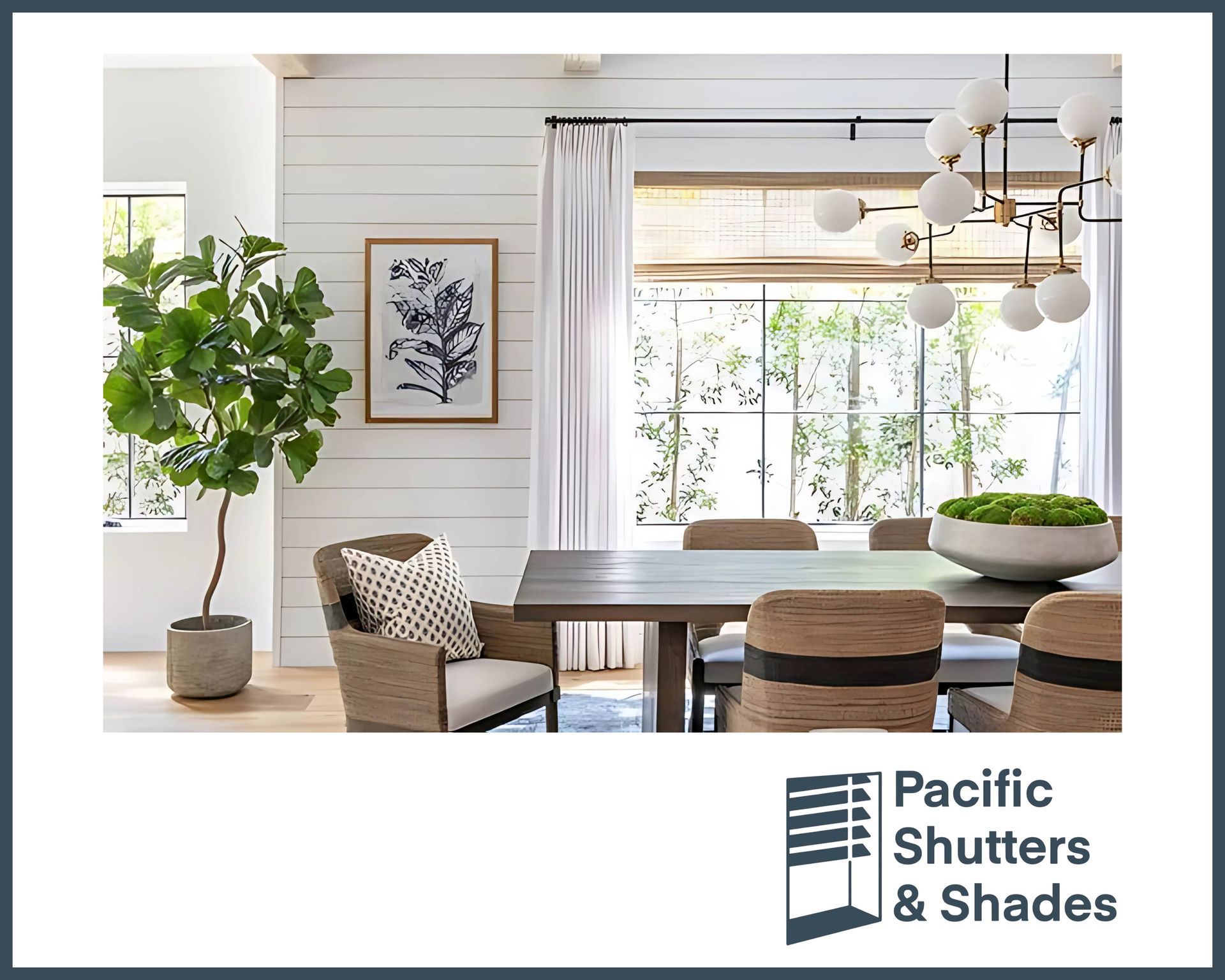 Dining room with white walls, large window, wooden table, chairs, and leafy plant.