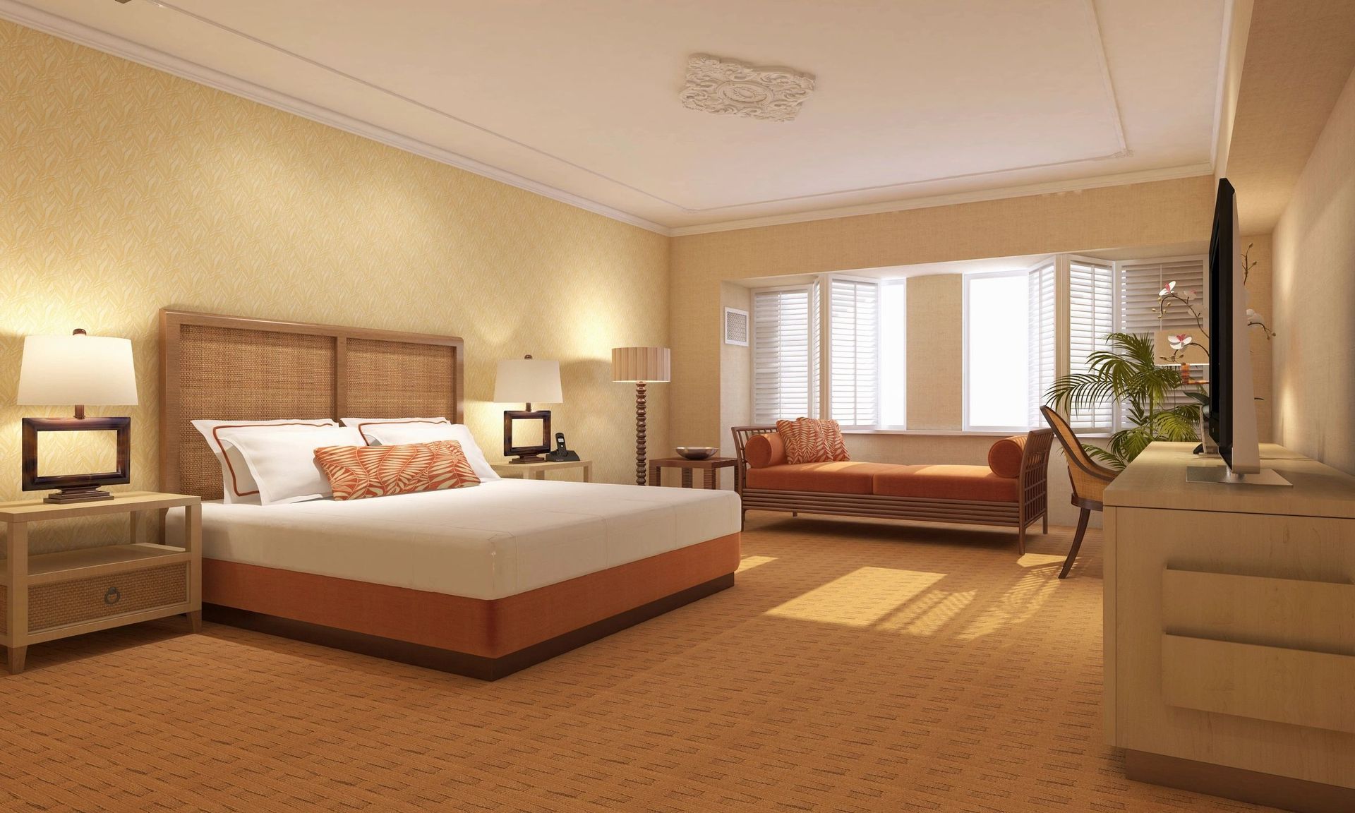 A hotel room with a large bed and a couch