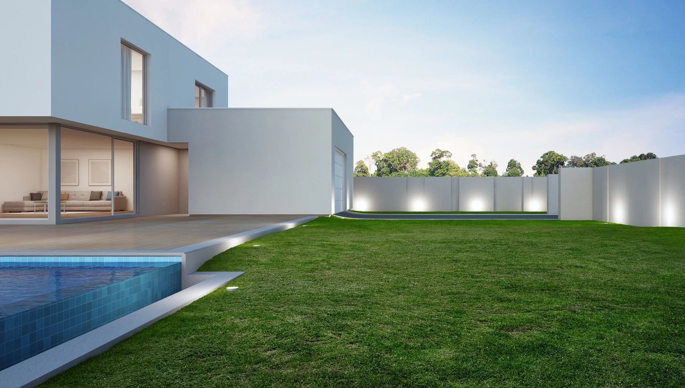 A modern house with a swimming pool in the backyard.