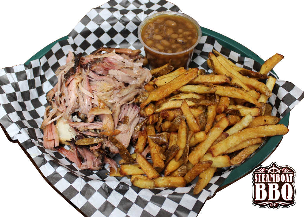 A plate of pulled pork and french fries with beans on a checkered napkin.