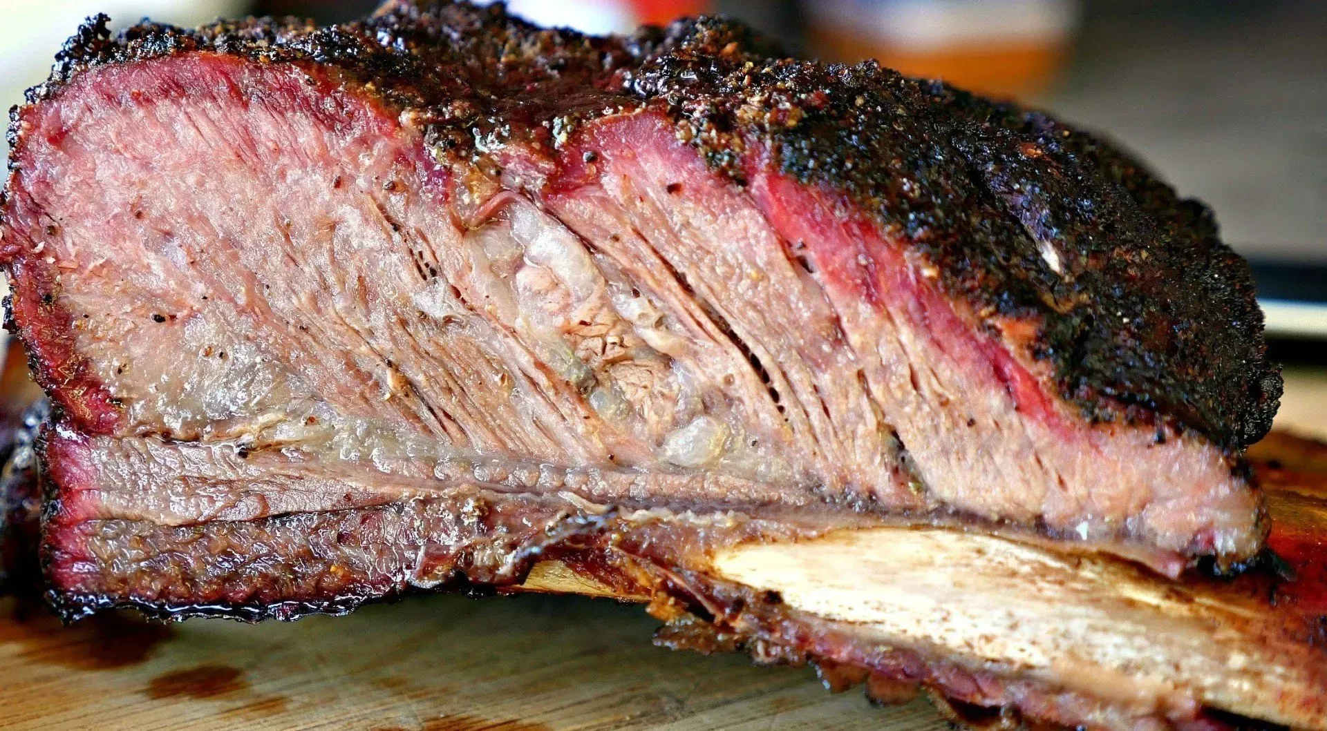 A close up of a piece of meat on a cutting board.