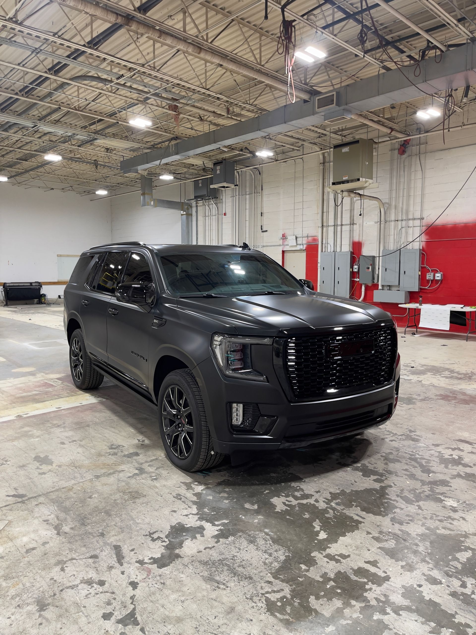 Black SUV with professional automotive window tint