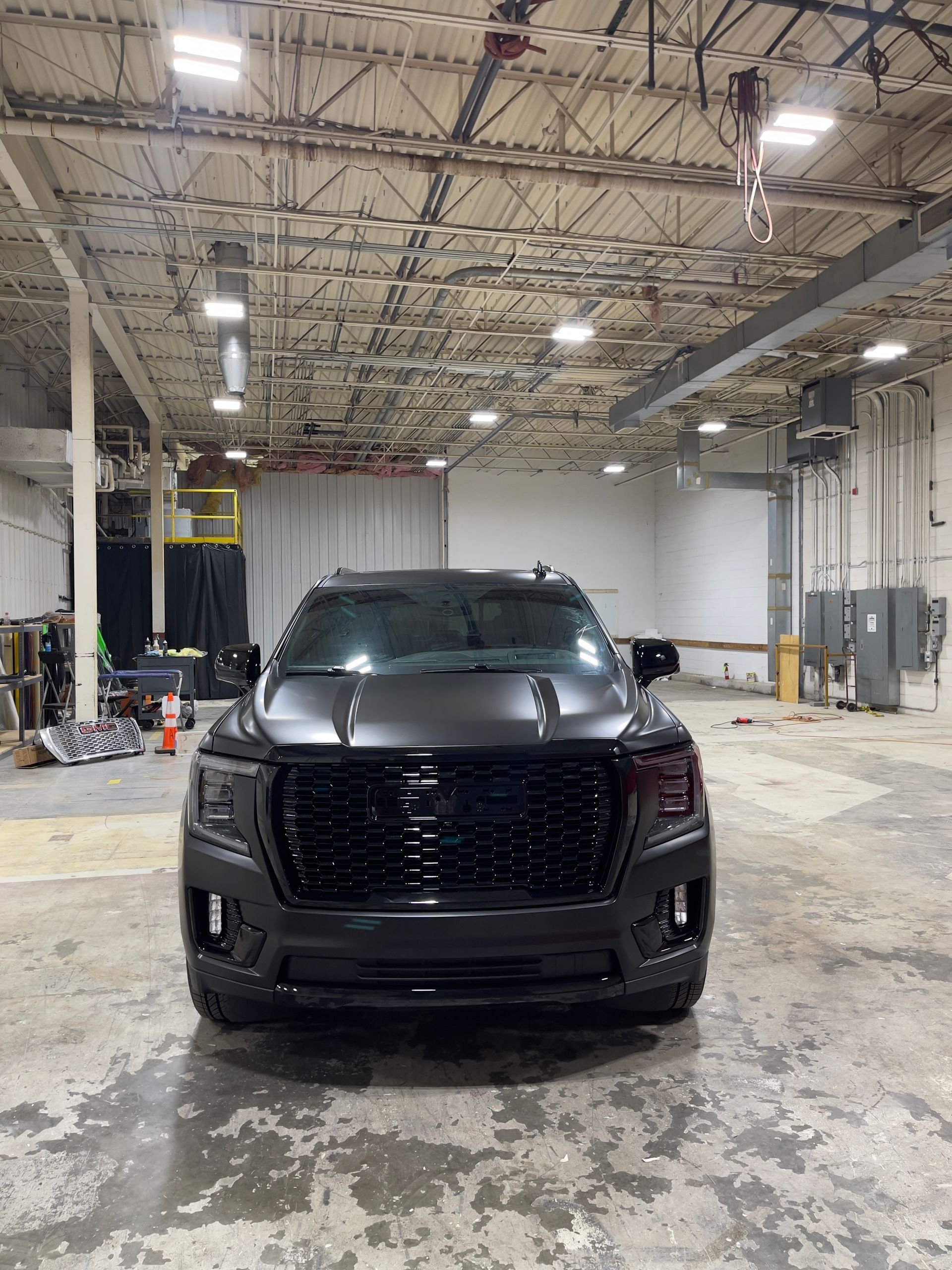 Front view of a tinted black SUV