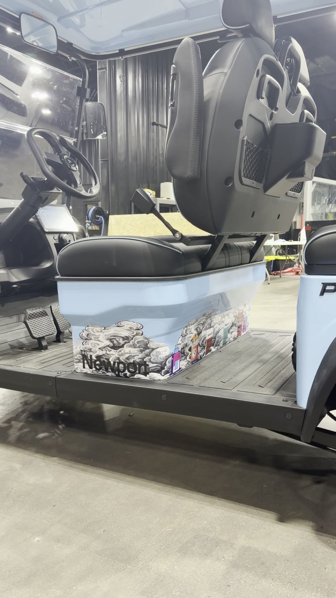 Cloud 9 themed graphics on the golf cart seat back