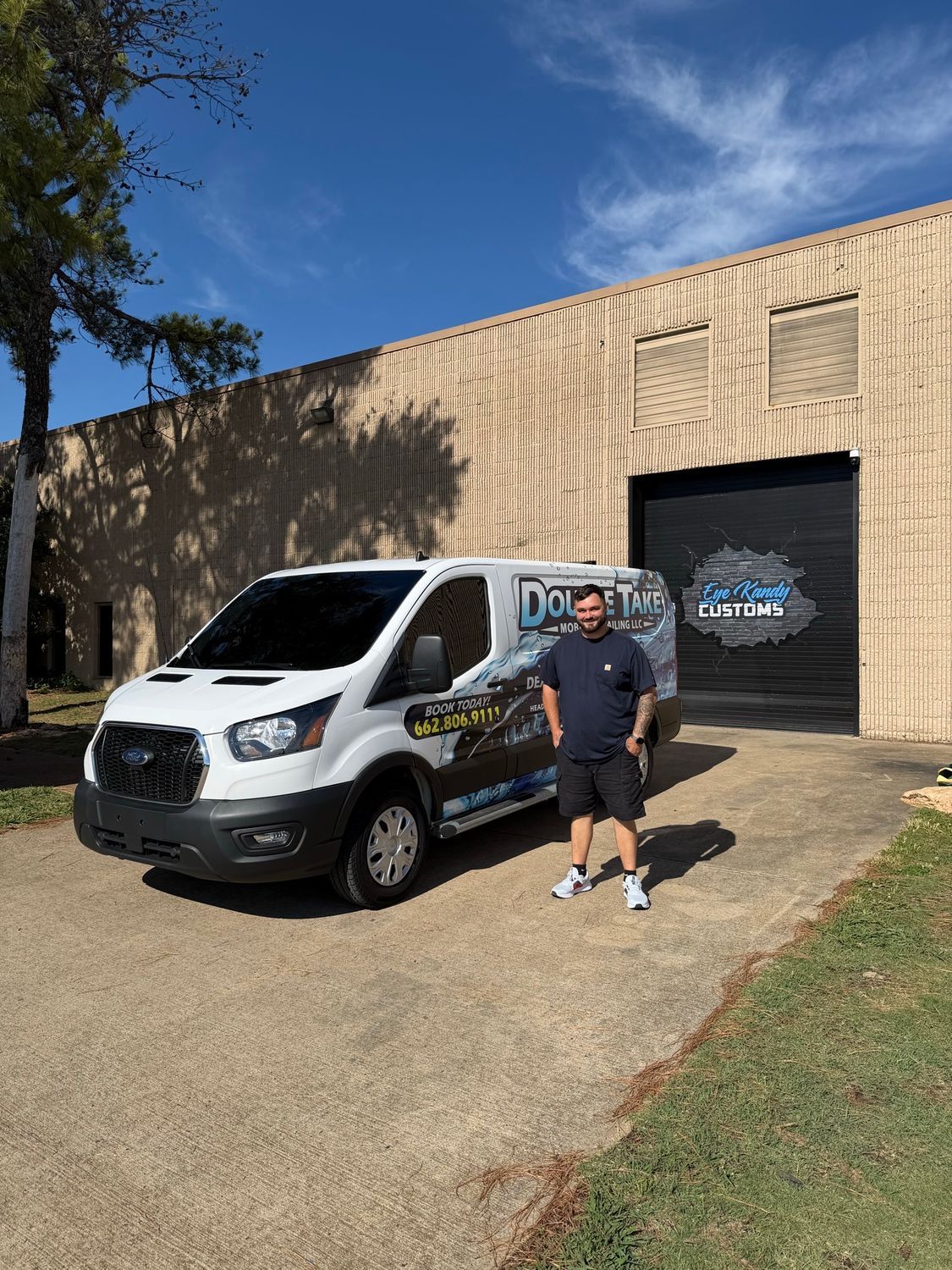 Joe Colwell with his Double Take Mobile Detailing van wrapped by Eye Kandy Customs