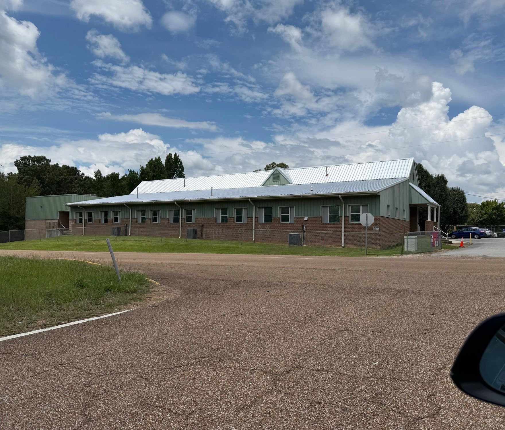 Exterior of H.W. Byers School in Holly Springs, MS after commercial window tint by Eye Kandy Customs