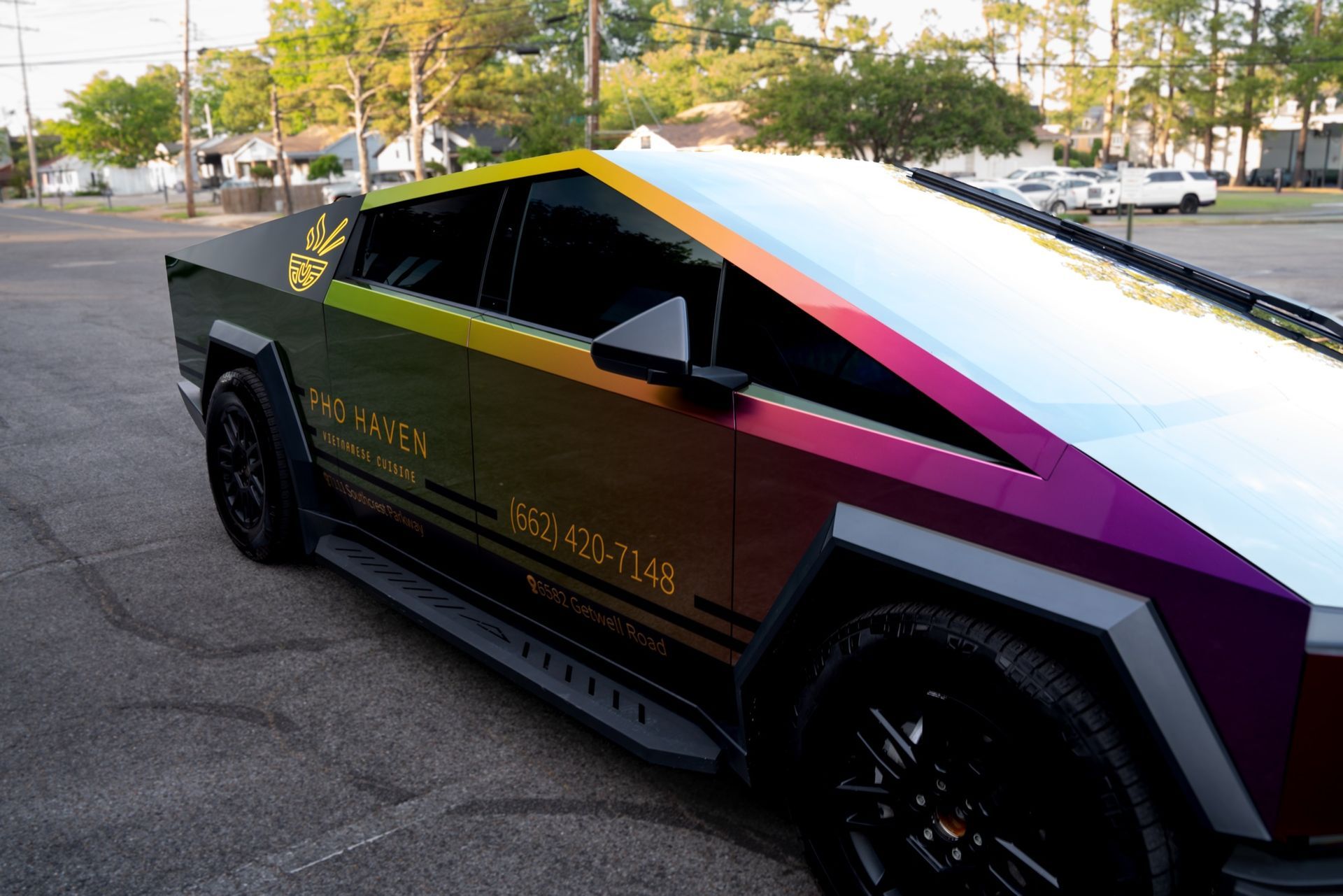 Low angle view of the Pho Haven Cybertruck color shift wrap by Eye Kandy Customs
