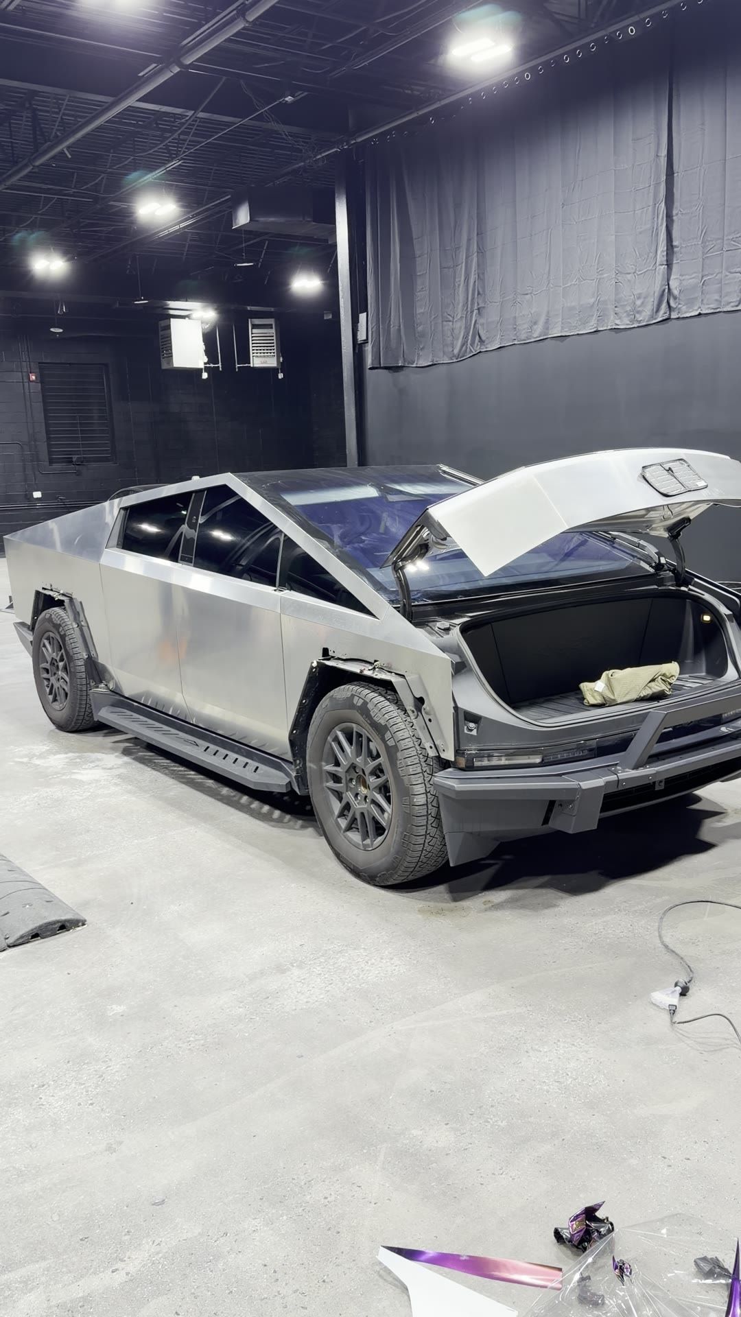 Pho Haven Cybertruck stripped back to bare stainless steel before the new wrap