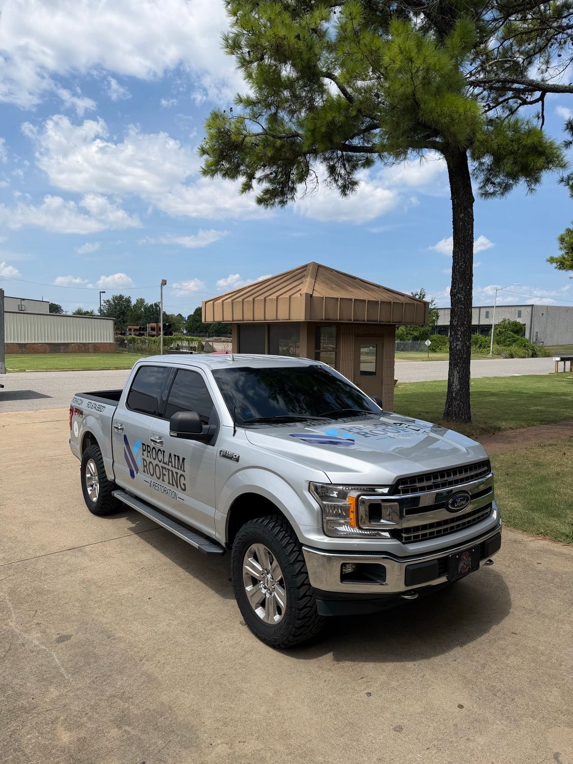 Proclaim Roofing Ford F-150 with fleet decals by Eye Kandy Customs in Olive Branch, MS