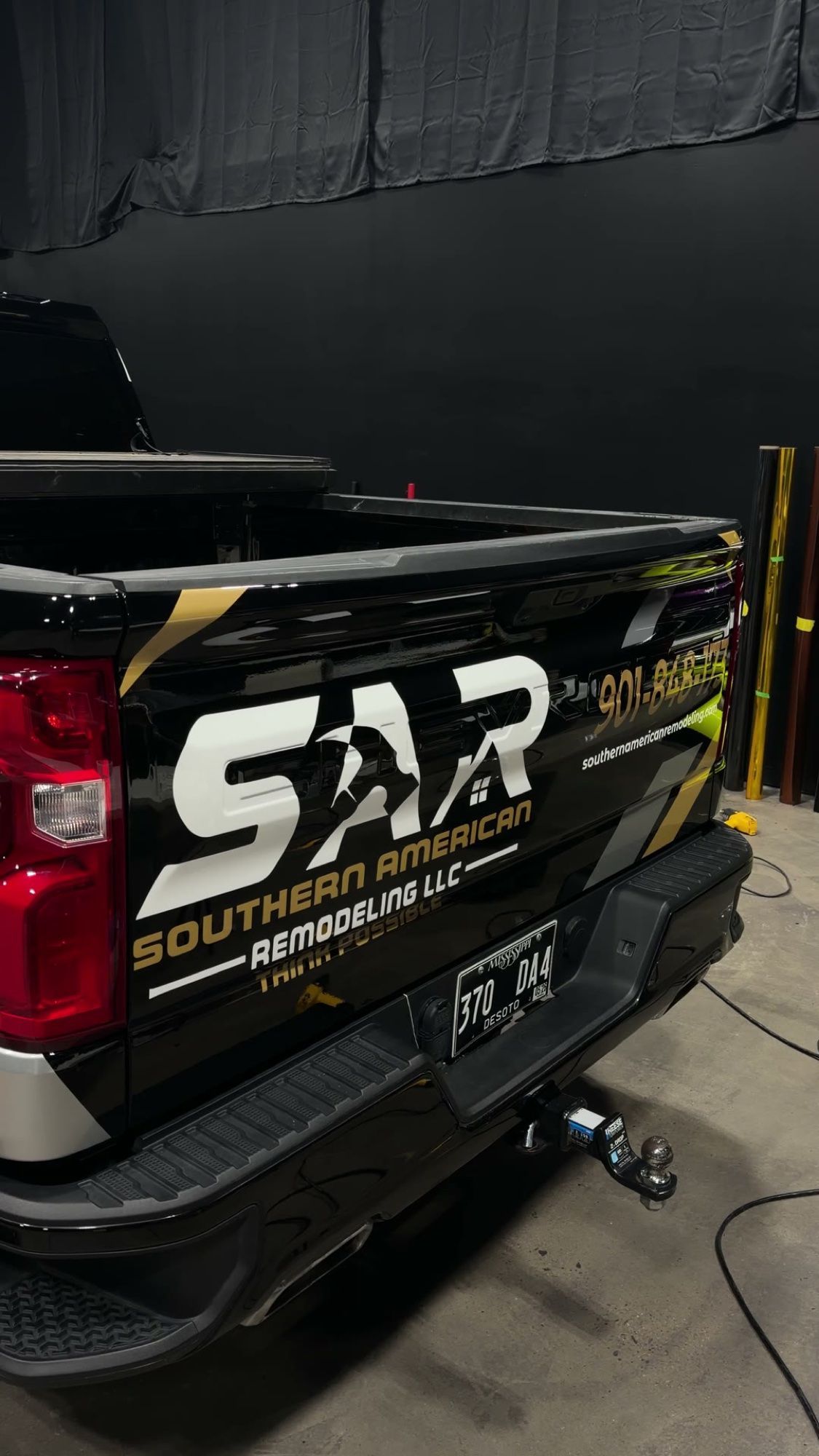 Tailgate graphics on the Southern American Remodeling truck
