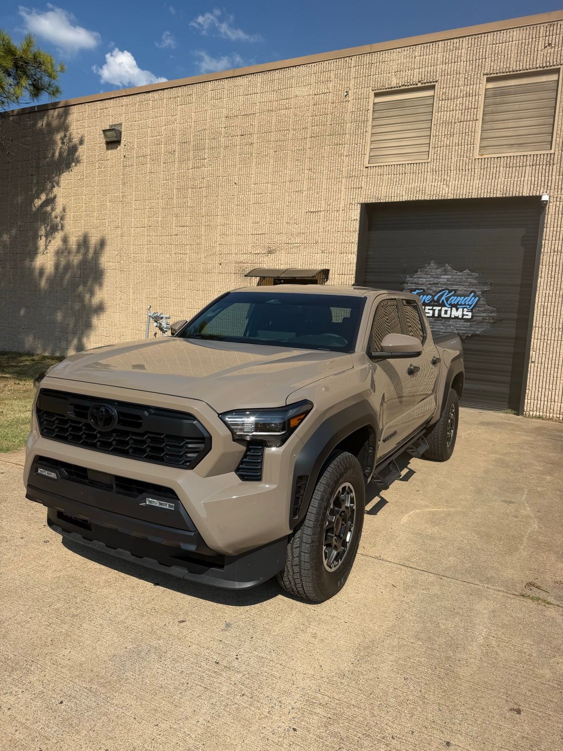 Toyota Tacoma TRD with paint protection film outside Eye Kandy Customs in Olive Branch, MS