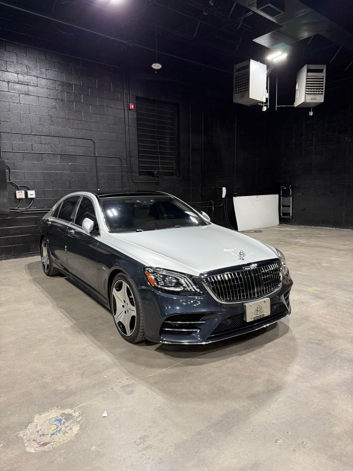 Two-tone Mercedes S-Class with 3M White Aluminum Metallic Maybach style wrap by Eye Kandy Customs in Olive Branch, MS