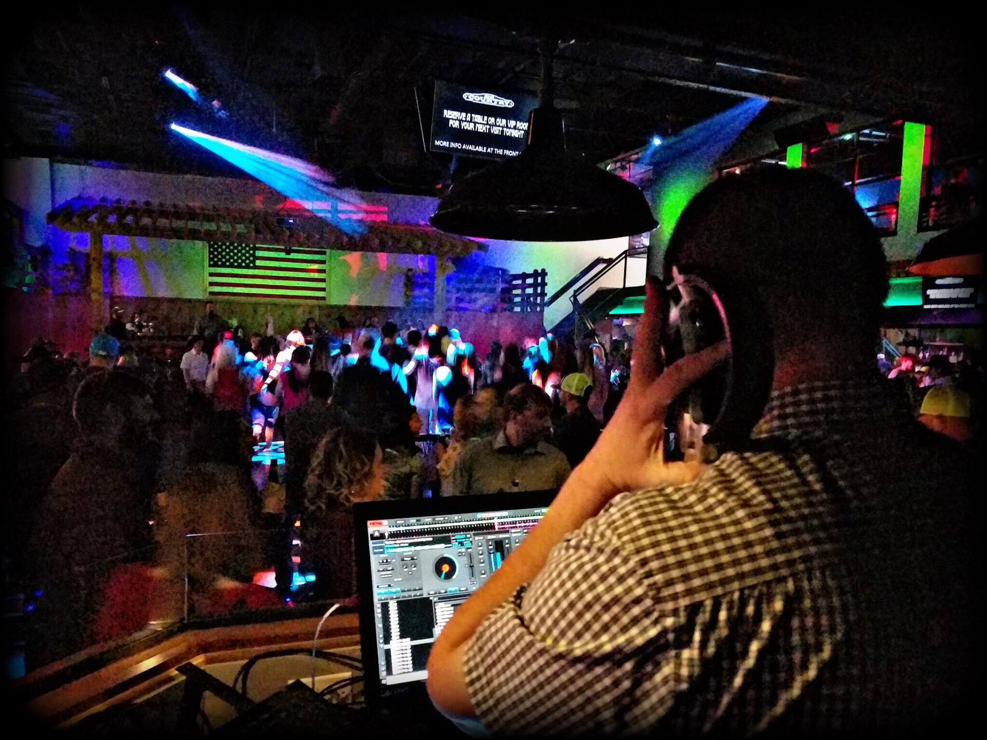 dj playing disco music at nightclub