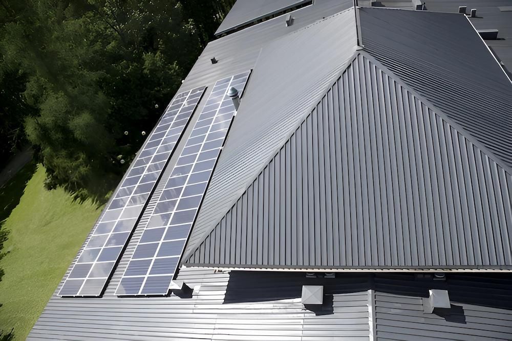 An Aerial View of a Roof With Solar Panels on It — Ron Nickel Roofing in Nerang, QLD