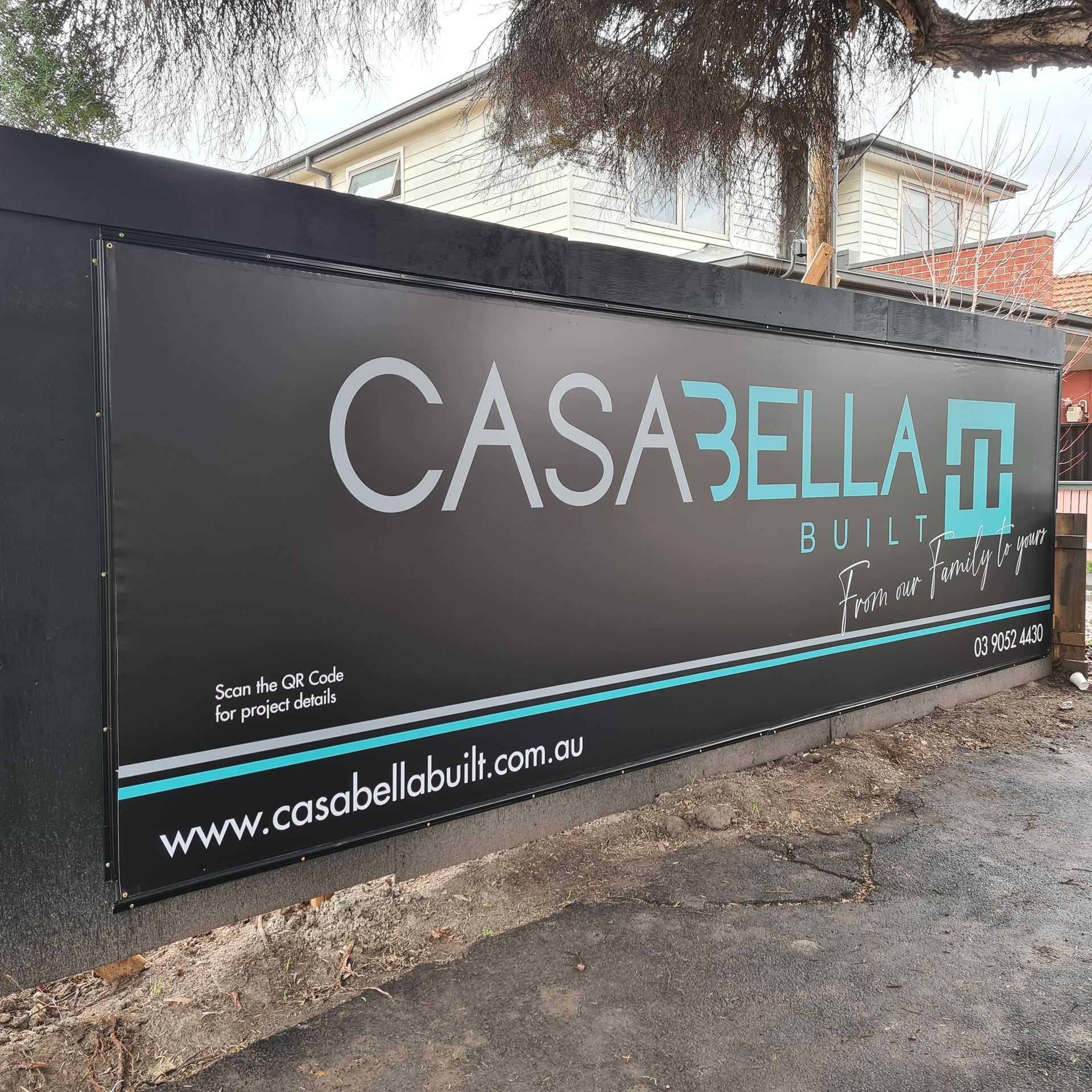 A large black sign that says casabella on it