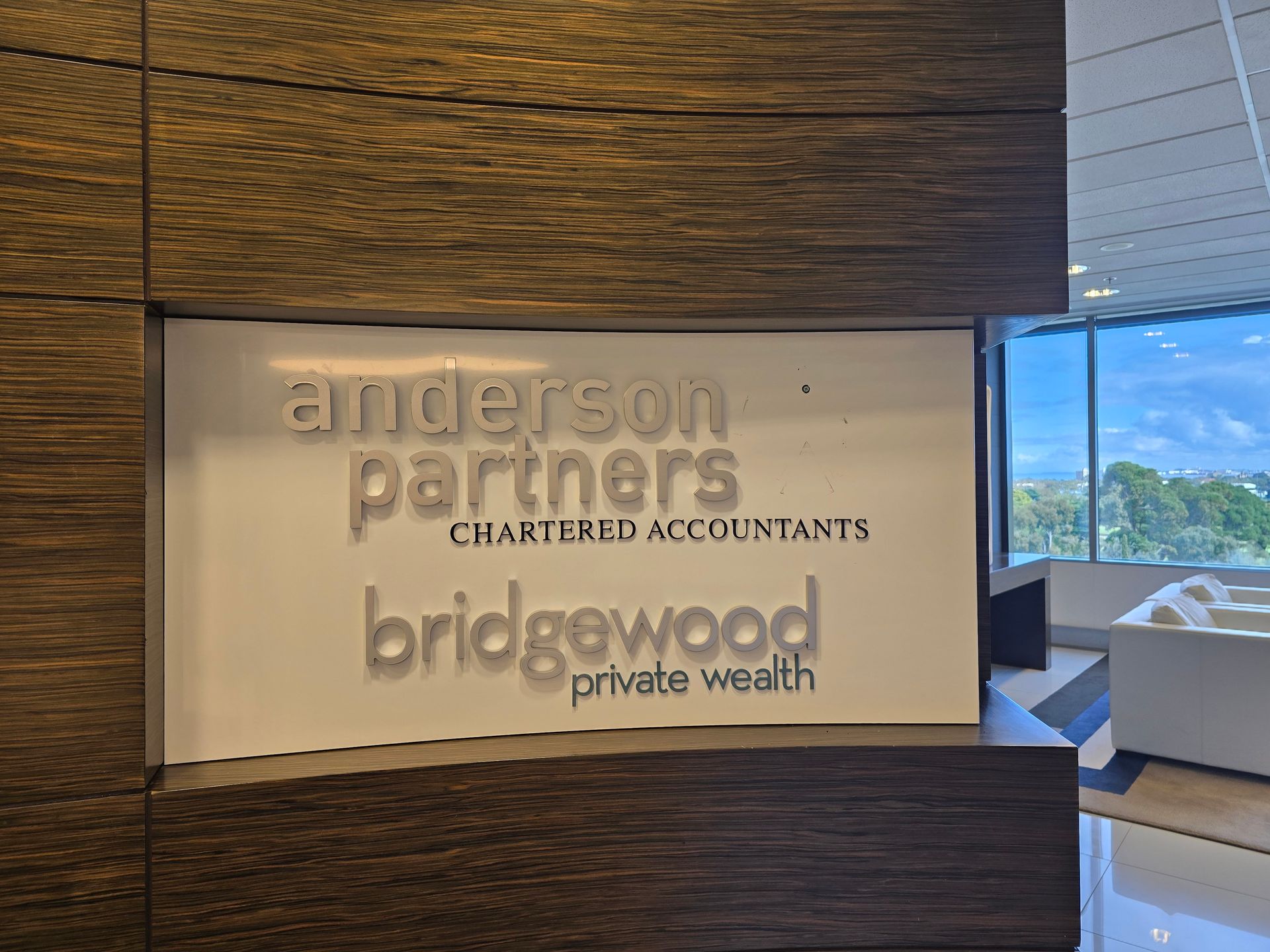 A sign for anderson partners chartered accountants and bridgewood private wealth