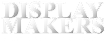 The word display makers is written in white letters on a white background.