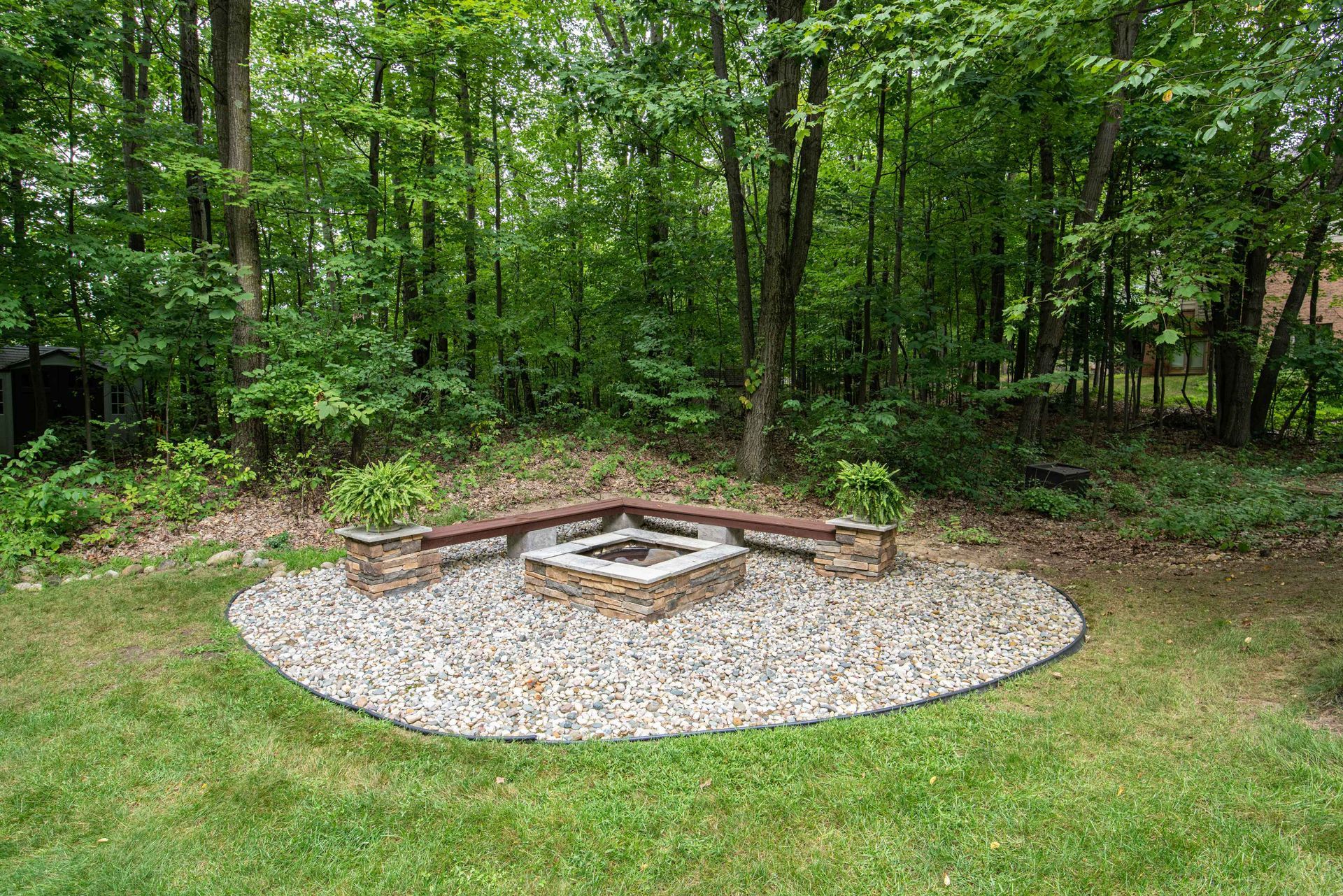 A fire pit in someone's backyard