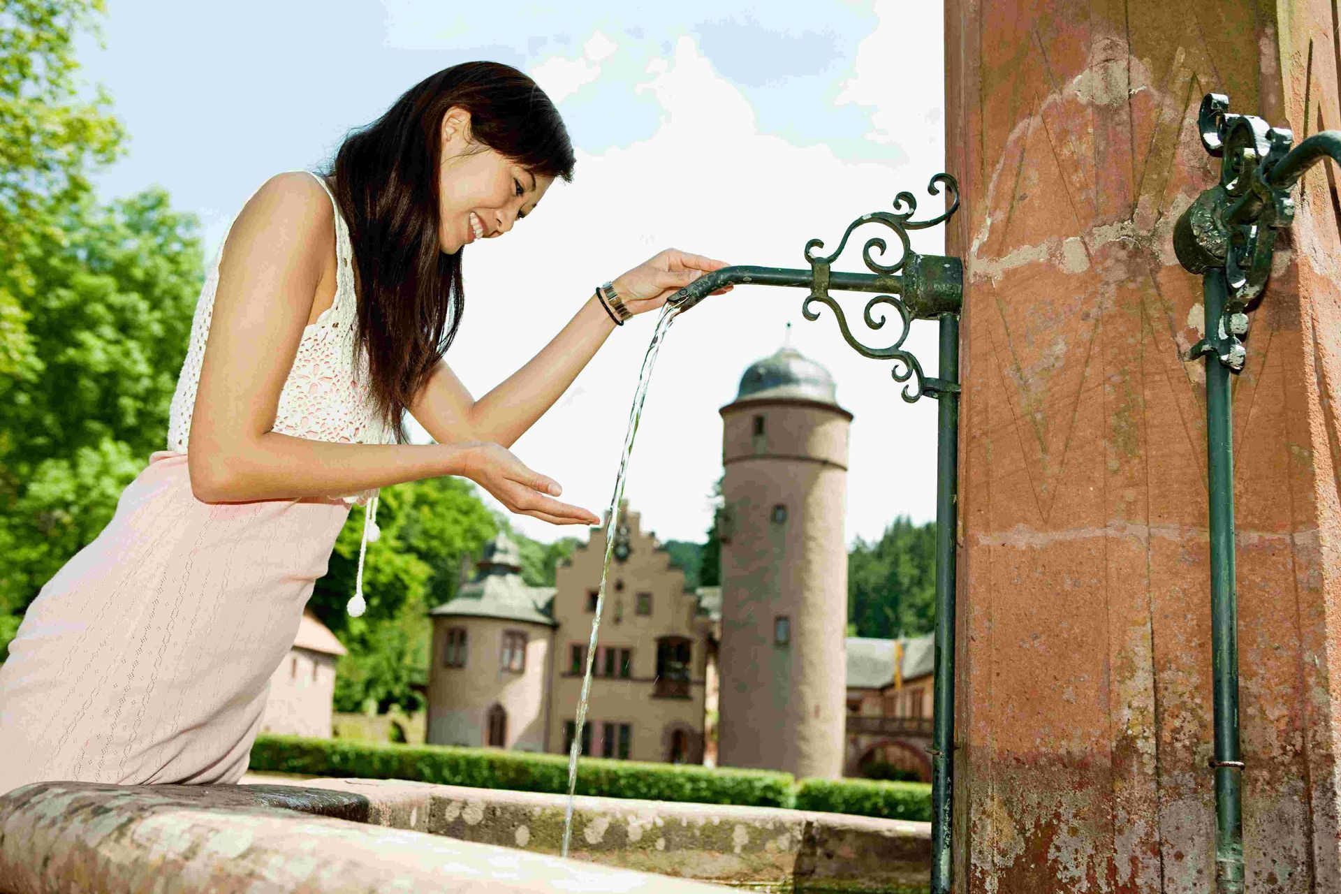 A woman with running water