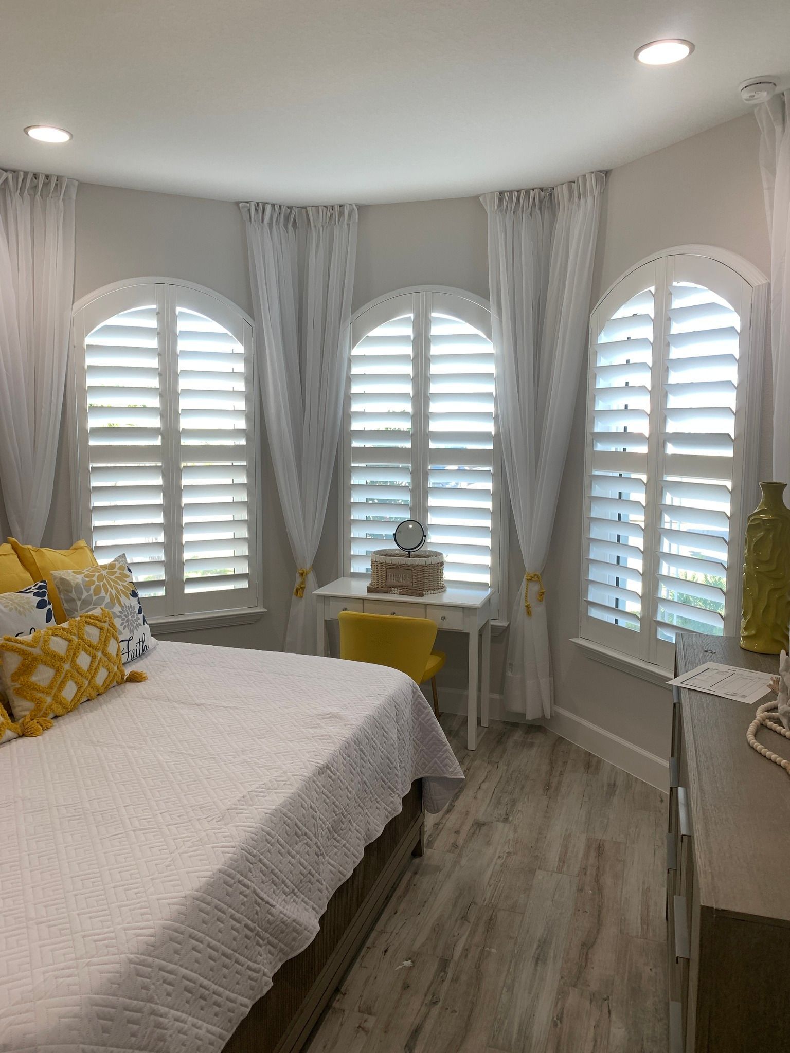 Arched Plantation Interior Shutters.