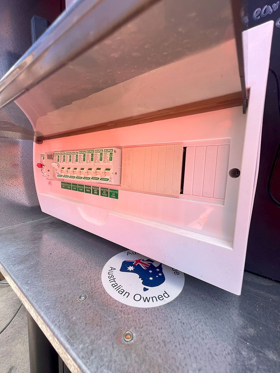 Open Electrical Panel Mounted on a Metal Surface — JMB Electrical Services In Port Kembla, NSW